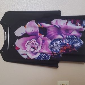 Peter Nygard long shirt. Medium size but ran big. Black with purple floral.